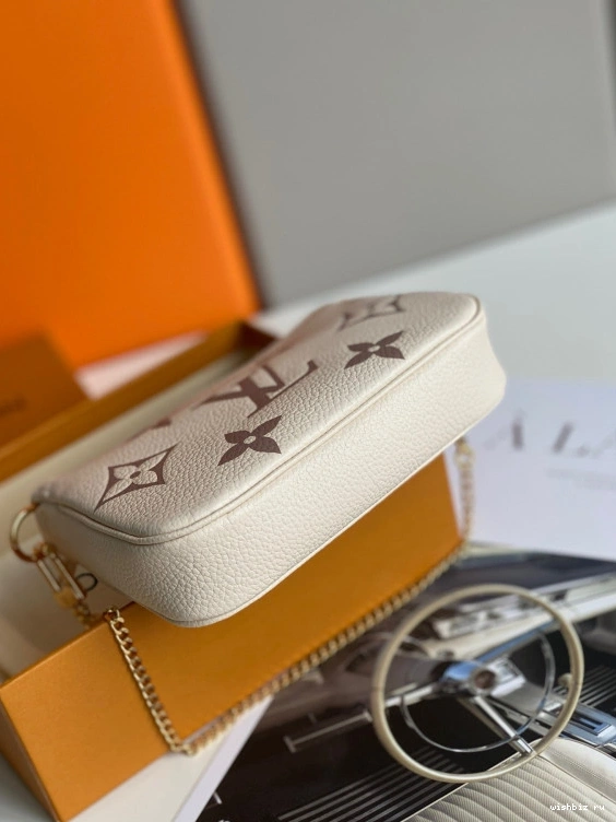 WIS LOUIS MINI VUITTON POCHETTE ACCESSOIRES 1023